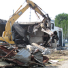 Welding shop makes way for road