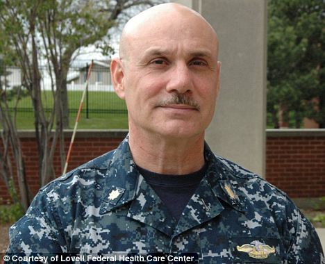 Hero: Knowing the danger, U.S. Navy Nurse Corps Lieutenant Commander James Gennari, pictured, heroically helped the wounded Corporal Perez, saving his fellow soldier's life while risking his own