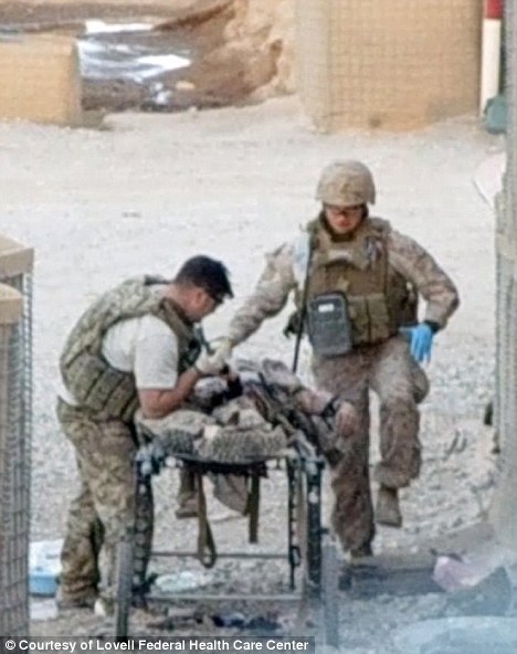 Miracle: Army Staff Sgt. Ben Summerfield, left, and Lt. Cmdr. James Gennari, right, successfully removed the grenade