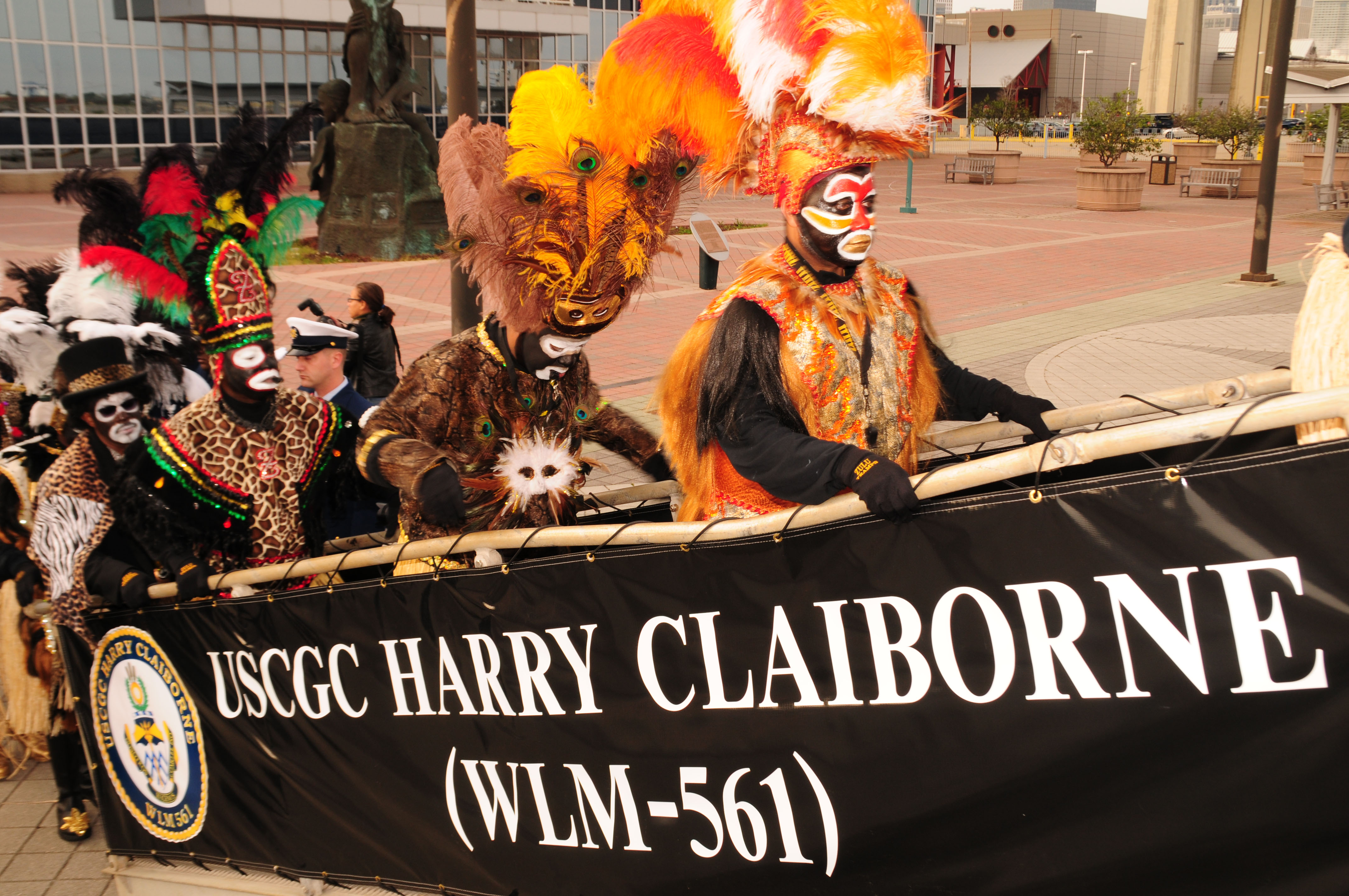 NEW ORLEANS - The Krewe of King Zulu embarks the Coast Guard Cutter Harry Claiborne for their transport to Spanish Plaza in downtown to kick off the start of Lundi Gras, Feb. 20, 2012. The 175-foot coastal construction tender delivered the Mardi Gras monarchs Kings Rex and Zulu for Lundi Gras 2012. U.S. Coast Guard photo by Petty Officer 2nd Class Bill Colclough. 